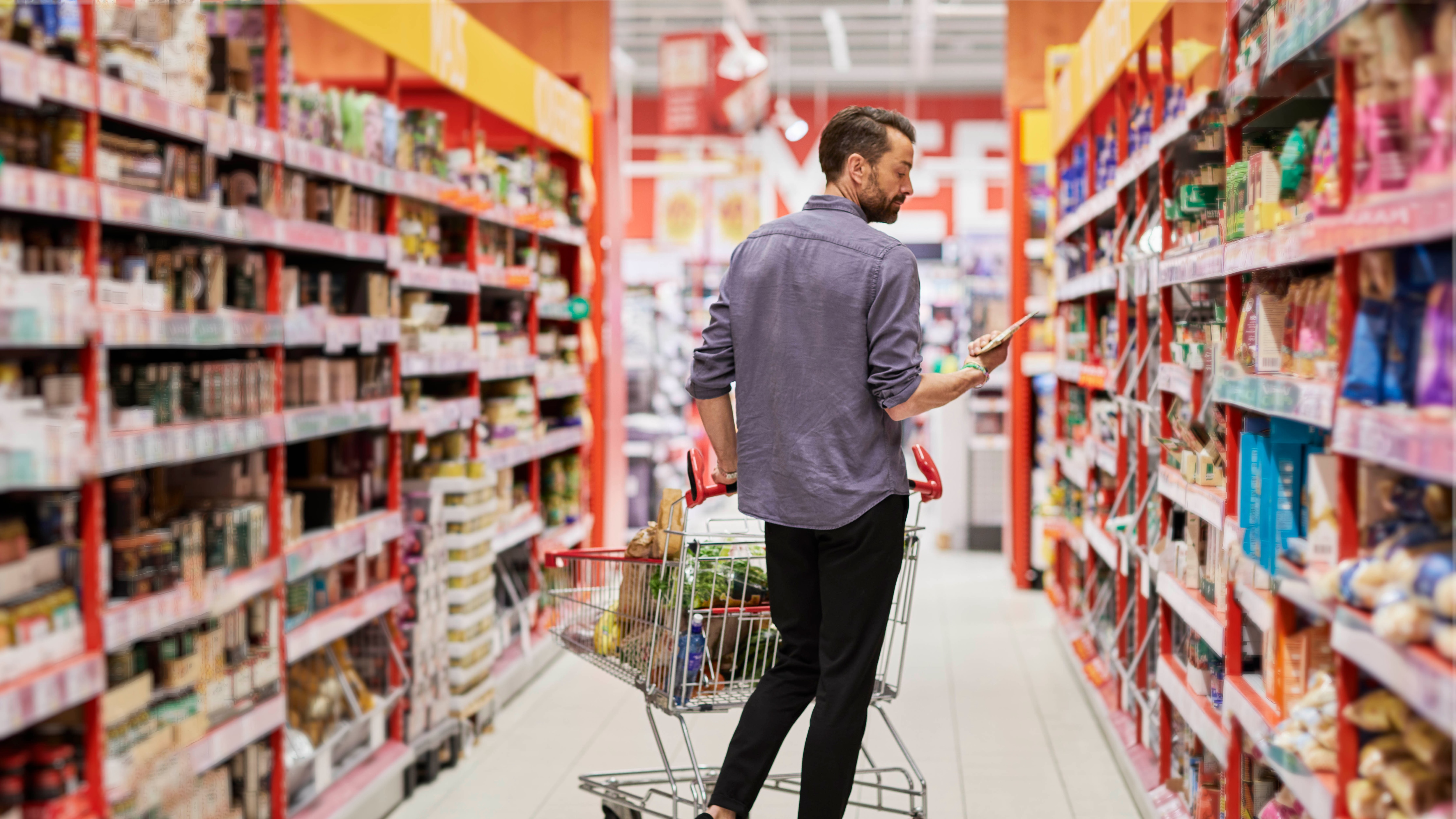 Man shopping in the supermarket