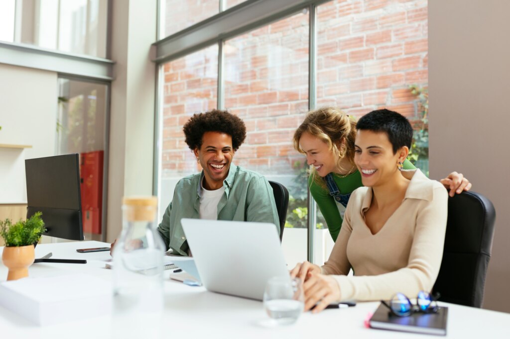 A group of happy and engaged employees in the office