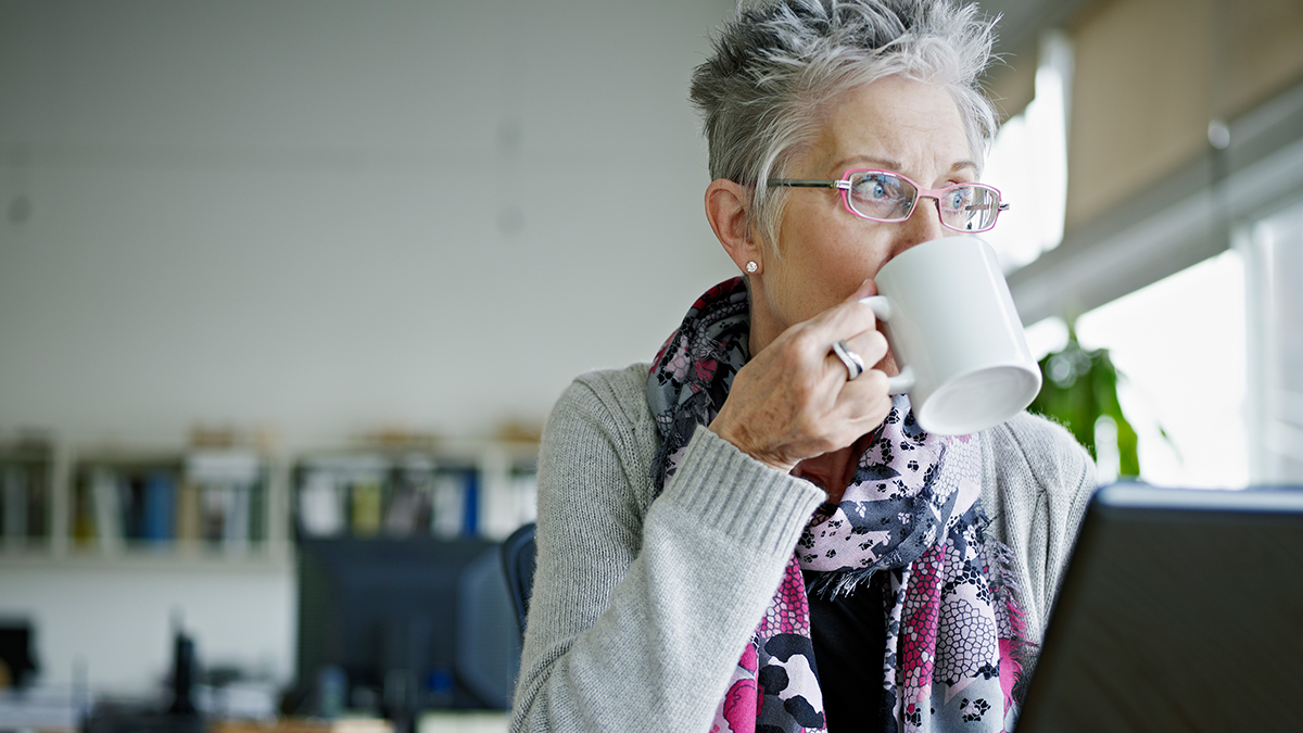 older woman drinking tea