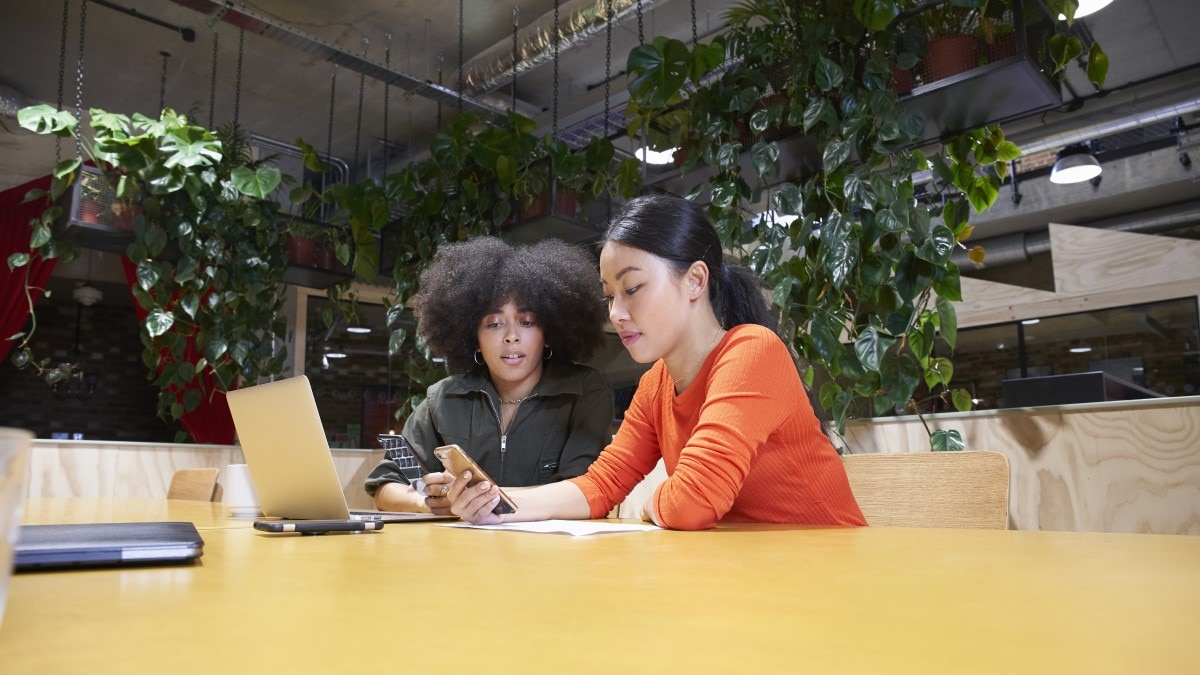 two young women discussing