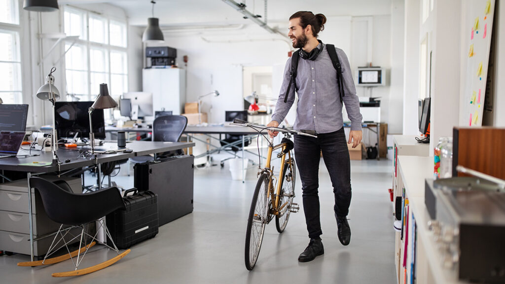 An employee enjoying the benefit of a cycle to work scheme in the office