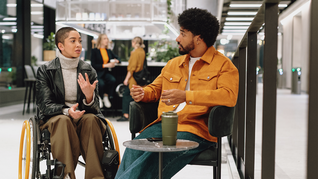 Two colleagues sitting together to discuss workforce planning