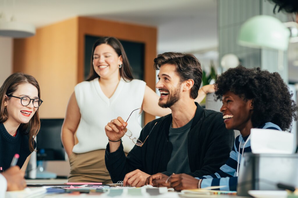 Young people having a meeting in an office