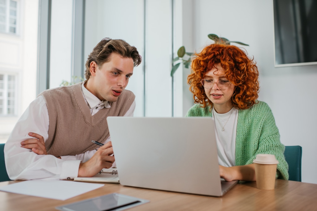 Two hiring managers filtering candidates