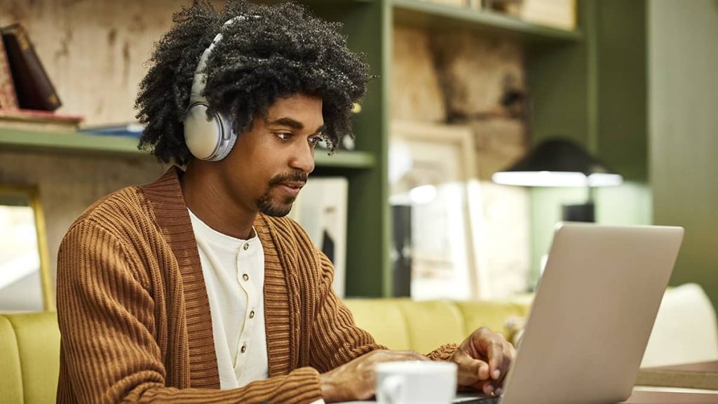 An employee working from home on a laptop