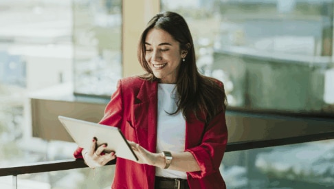 Recruiter looks at a tablet in an office