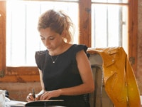 A woman writing the job description for a new role