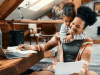 hybrid working mother with her child