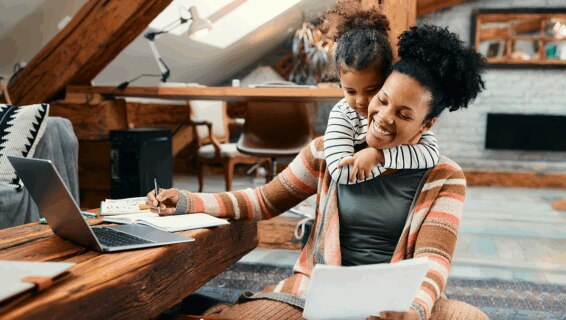 hybrid working mother with her child