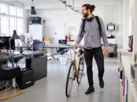 An employee enjoying the benefit of a cycle to work scheme in the office