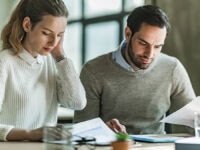 Two colleagues conducting the salary review process