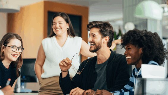 Young people having a meeting in an office