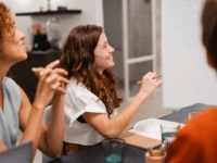 Happy and engaged colleagues conducting a business meeting in an office environment