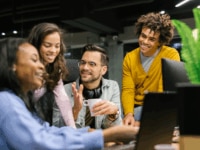 Employees discussing the benefits of generative AI