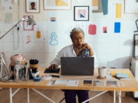 A female employee over 50 working at her desk