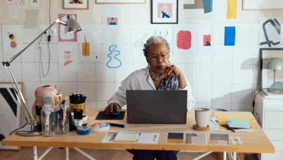 A female employee over 50 working at her desk