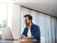 A manager conducting a video interview with a candidate