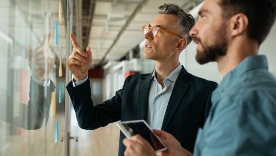 Two colleagues working on implementing a succession plan