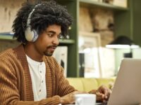 An employee working from home on a laptop