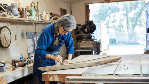 An older employee in a workshop